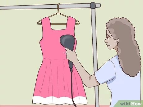 3 Easy Ways to Steam Dresses - wikiHow How To Steam Clothes With A Steamer, Steam Clothes, Closet Renovation, Handheld Steamer, Clothes Steamer, Shower Rod, Green Cleaning, Creative Crafts, Simple Dresses