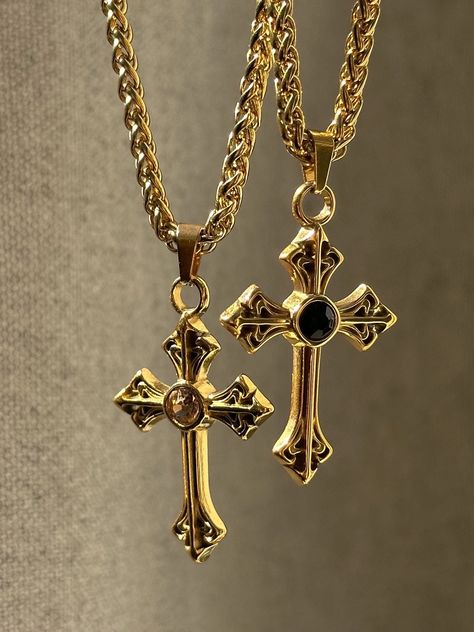 The Saint Necklace 🤍 Featuring a unique gold cross of your choice and an 18k gold plated stainless steel woven chain. Shower proof!  I tried to show both colors in various settings with different lighting- they both feature a cz crystal (choose between champagne and black)  Unisex & tarnish proof- choose desired length at checkout 🖤 each will come with an extender for adjustability.  Made with love 🫶 Black And Gold Cross Necklace, Gold Plated Stainless Steel Jewelry, Gold Black Jewelry, Unique Cross Necklace, Black Dress Gold Jewelry, Big Cross Necklace, Black And Gold Jewelry, Saint Necklace, Dope Jewelry Accessories