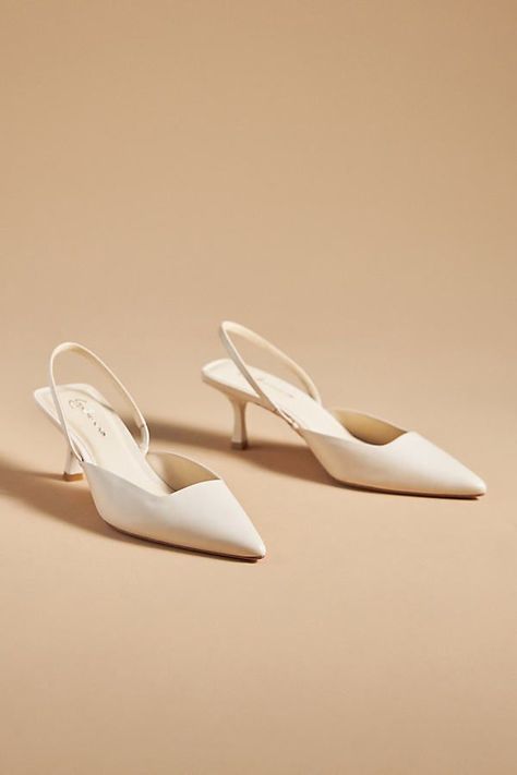 Wedding shoes low heel for elegant brides who want to maintain style without sacrificing comfort. Ivory Slingback Heels, Slingback Wedding Shoes, Bridal Slingback Heels, Timeless Wedding Shoes, Low Heel Wedding Shoes Brides, Elegant Slingback Heels, Shoes For White Dress, Wedding Dress With Shoes, Low White Heels