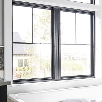 Window Grids or No Grids? A Guide to Grille Styles | Pella Windows & Doors Black Window Grids Exterior, Sunroom With Black Windows, Pella Sliding Doors, White Ranch With Black Windows, Pella Casement Windows, Window Mullion Styles, Windows With No Grids, Gridless Windows Exterior, Window Grids Or No Grids