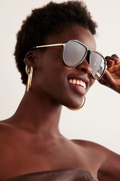 Make a statement in these so bold sunnies featured in an oversized aviator design with gradient tinted lenses and a cool brow bar. * Padded temples * Rounded frames | Ventura Oversized Aviator Sunglasses by Free People in Brown