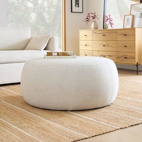 Ottomans & Footstools | West Elm Large Round Storage Ottoman, Bedroom Closet With Vanity, Round Ottoman Living Room, Modern Ottomans, Cozy Coastal Living Room, Circle Ottoman, Round Ottoman Coffee Table, Large Round Ottoman, Beige Ottoman