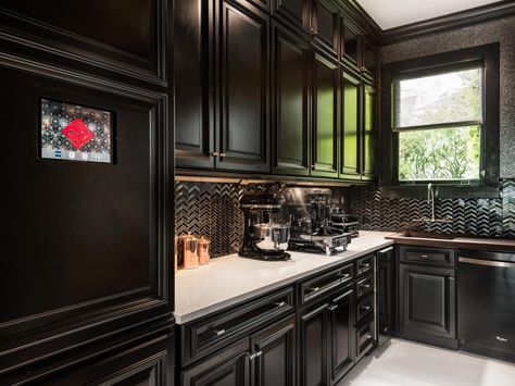 Kitchen cabinets with black appliances