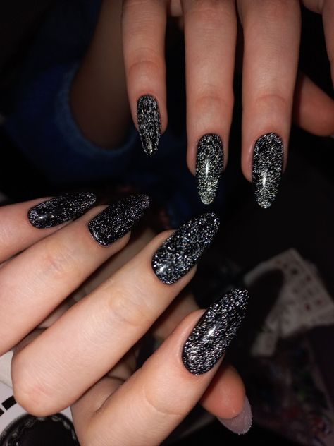 Black Glitter Wedding Nails, Black Acrylic Nails Almond Glitter, Black Gliterry Acrylic Nails, Black And Silver Prom Nails Almond, Sparkly Dark Nails, Black Disco Nails, Dark Glittery Nails, Black Silver Glitter Nails, Dark Sparkle Nails