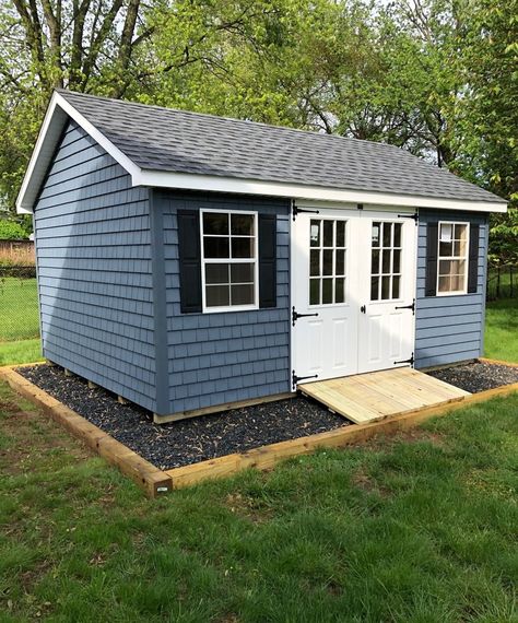 Cottage Storage Shed, Painted Storage Shed, Shed Planting Ideas, Border Around Shed, Behind Shed Ideas, Blue Shed Ideas, Blue Shed Colors, Outdoor Shed Color Ideas, Outdoor Shed Colors