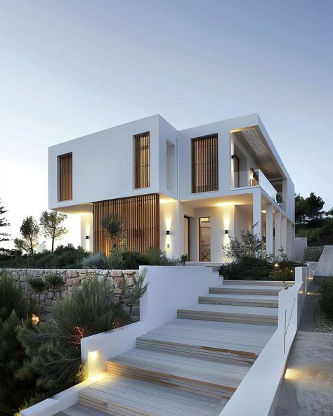 50+ White Interior Spaces: From Minimalist to Luxe All White Homes Exterior, White Exterior House With Wood Accents, White Exterior House, Modern House Lighting, Modern Scandinavian House, White Concrete House, White Stucco House, White Home Exterior, Cement House