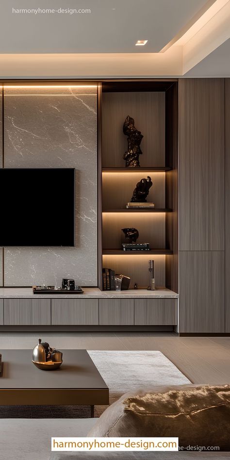 A polished TV wall adds subtle lighting and contrasting materials for visual interest. Tv Unit With Marble, Hall Tv Unit, Tv Unit Wall, Timeless Living Room Interior Design, Timeless Living Room, Hall Room, Tv Room Design, Media Wall, Living Room Tv Wall