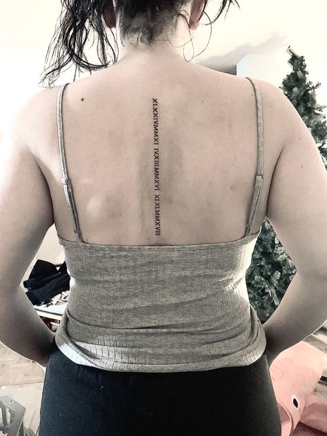 Spine Roman Numeral Tattoo, Roman Numeral Spine Tattoo, Back Tattoo Women Spine, Roman Numeral Tattoo, Numeral Tattoo, Roman Numeral Tattoos, Date Tattoos, Roman Numbers, Spine Tattoos For Women