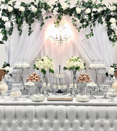 Tbt to this beautiful white and silver candy dessert table by @bizziebeecreations #minidonuts #floral #backdrop #eventdecor #eventplanner… Bridal Desserts, Blush Pink Wedding Centerpieces, Candy Dessert Table, Romantic Dinner Decoration, 25th Wedding Anniversary Party, Treat Table, Dessert Table Decor, Rose Gold Party, Wedding Dessert Table