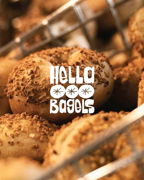 Hella Bagels is a bagel shop that embraces a community-first approach, crafting hand-rolled bagels baked fresh every day for the lucky locals in the Bay Area, California. I had the opportunity to develop their brand identity, focusing on bold abstract shapes with a handmade, tactile feel. This new visual presence, complemented by a diverse illustration pack, is designed to be highly adaptable across digital and print applications, ensuring that Hella Bagels’ cohesive identity supports its gr... Bagel Shop Aesthetic, Bagel Branding, Diverse Illustration, Bagel Board, Bagel Store, Bagel Shop, Bay Area California, Ads Design, Inspiration Logo