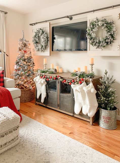 Our Cozy Christmas Living Room Christmas Decor In Small Living Room, Entertainment Stand Christmas Decor, Christmas Living Room Apartment, Christmas Decor Entertainment Center, Christmas Decor Ideas For Living Room Tv, Christmas Decor Around Tv, Cozy Christmas Living Room Apartment, Christmas Tv Decor, Christmas Decor Ideas For Living Room Apartment