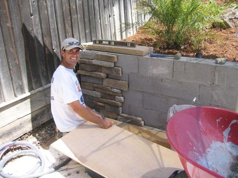 covering cement blocks with rock facing.  The best way to dress up that oh so important retaining wall! Backyard Cement, Deck Wall, Nice Landscape, Cement Blocks, Cinder Blocks, Cement Walls, Casa Exterior, Cinder Block, Have Inspiration