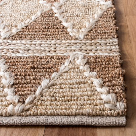 The Natural Fiber Rug Collection features an extensive selection of jute rugs, sisal rugs and other eco-friendly rugs made from innately soft and durable natural fiber yarns. Subtle, organic patterns are created by a dense sisal weave and accentuated in engaging colors and craft-inspired textures. Many designs made with non-slip or cotton backing for cushioned support. Care Instructions: Vacuum Without Beater Bar Coastal Area Rugs, Safavieh Rug, Woven Area Rug, Jute Area Rugs, Natural Fiber Rugs, Sisal Rug, Jute Rug, Beige Rug, Beige Area Rugs