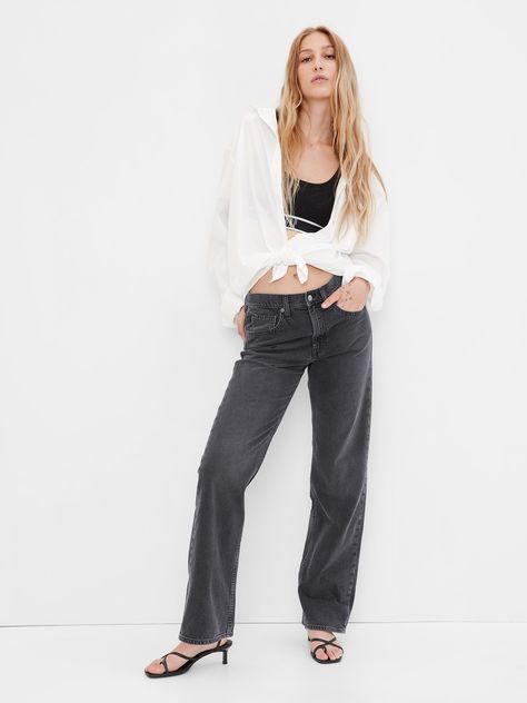 Fit: A full-length loose jean that's fitted on the waist & relaxed all the way down.  Size down for a slimmer fit.  Fabric: 99% Organic Cotton, 1% Stretch.  Stretch: Low Stretch Jeans.  Authentic denim with a soft & easy lived-in feel. ​ Rise: Mid Rise Jeans.  Look: A distressed five-pocket jean in a medium wash with fading & whiskering.  Undone split hems.  Details: Zip fly & five-pocket styling.  Responsibly Made: This pair of jeans is part of our water-saving Washwell program.  Compared to co Jeans Look, Loose Jeans, Gap Women, Boot Cut Denim, Gap Denim, Low Rise Jeans, Gap Jeans, Mid Rise Jeans, Stretch Jeans