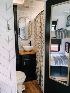 Camper Bathroom Makeover, Camper Door Makeover, Camper Bathroom Remodel, Camper Flooring, Camper Bathroom, Farmhouse Wall Sconces, Rv Interior Remodel, Camper Interior Design, Camper Kitchen