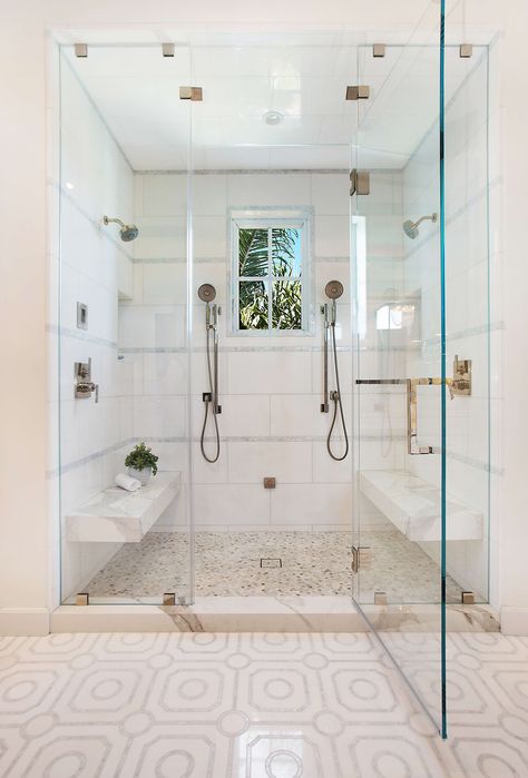 An all white shower with glass doors with multiple shower heads. Our bathrooms at home see a lot of action, and when it is a shared bathroom, the activity doubles. From master baths to Jack and Jill baths, consideration needs to be taken on how the room will function for those using it, regardless if one person is using the space, or if the room is truly shared at the same time... Read more on the Dura Supreme Blog! Showers For 2 People, Large Shower With Two Shower Heads, Shower For Two Walk In, Double Shower Head Bathroom, Two Headed Shower Ideas, Shower With Two Heads Master Bath, Couple Showers Bathroom, Two Person Shower Walk In, 2 Person Shower Master Bath