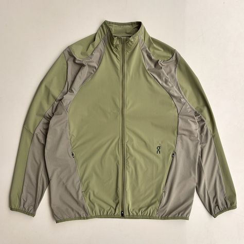 BREAKER PAF (ALOE) Concealed zippers for streamline silhouette. Pockets for protecting valuables. Elastic binding on sleeves, hem and collar. Shapeshifting forms. Packable for changing weather. Lighter textiles for breathable wear. Binding, Textiles, Elastic, Zipper, Collar, How To Wear, Quick Saves