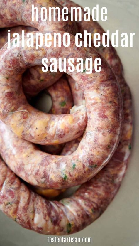 The juiciest and most flavorful Jalapeno Cheddar Sausage made from scratch with sharp cheddar cheese and fresh jalapeños, ground pork, beef and smoked bacon. Flavored with garlic, pepper, onion, sage and mustard. Incredibly juicy and delicious. Jalapeno Cheddar Venison Sausage, Cheddar Cheese Sausage Recipes, Making Your Own Sausage, Make Homemade Sausage, Wild Game Sausage Recipes, Jalapeno Smoked Sausage Recipes, Smoked Venison Sausage Recipe, Homemade Sausage Links With Casing, Sausage Making Recipes Pork