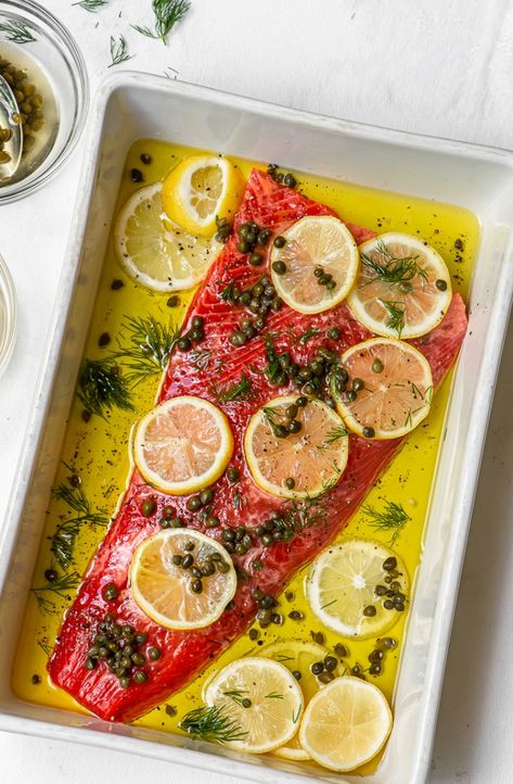 Slow Cooked Salmon with Lemons, Capers, and Dill | Sandra Valvassori Wild Caught Salmon Recipes Baked, Wild Caught Salmon Recipes, Wild Alaskan Salmon Recipes, Slow Cooked Salmon, Lent Meals, Holistic Eating, Wild Salmon Recipe, Cooked Salmon, Alaska Salmon