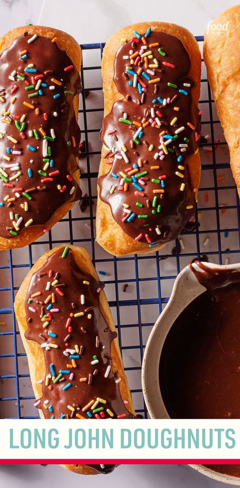 Recipe of the Day: Long John Doughnuts 🍩 Think a doughnut has to be round? Not according to Midwesterners, a group who loves their rectangular Long John doughnuts. This delicious pastry looks something like an éclair and is always deep-fried and covered in a sweet glaze. This version pairs a rich, yeast-risen dough with an easy chocolate glaze and classic colorful sprinkles for a delicious treat that will charm doughnut lovers from coast to coast. Long John Doughnut Recipe, Easy Chocolate Glaze, Chocolate Glazed Donuts Recipe, Doughnut Recipe Easy, Easy Donut Recipe, Yeast Donuts, Homemade Donuts Recipe, Sweet Glaze, Baked Donut Recipes