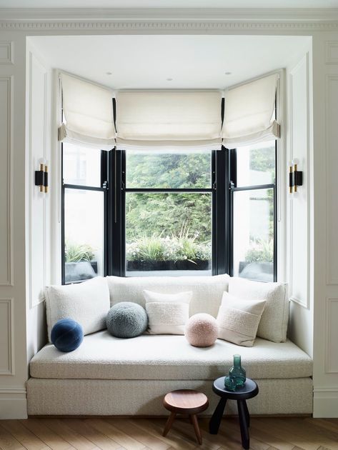 Notting Hill Apartment, Bay Window Seating, Bay Window Blinds, Bay Window Treatments, Window Seating, Green Headboard, Bay Window Seat, Bay Window Curtains, Custom Made Curtains