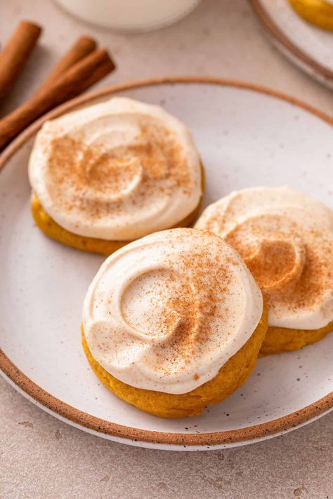 These pumpkin cookies with cream cheese frosting are so irresistibly soft and pillowy, everyone will be begging for more! Loaded with warm Fall spices, these soft pumpkin cookies are topped with a cinnamon cream cheese frosting that pairs perfectly. Bonus: They’re quick and easy to make, with no dough chilling needed! Soft Pumpkin Cookies With Cream Cheese Frosting, Pumpkin Cream Cheese Frosting, Pumpkin Cream Cheese Cookies, Pumpkin Cookies With Cream Cheese, Frosted Pumpkin Cookies, Turkey Desserts, Iced Pumpkin Cookies, Cream Cheese Spread Recipes, Sweet Pumpkin Seeds