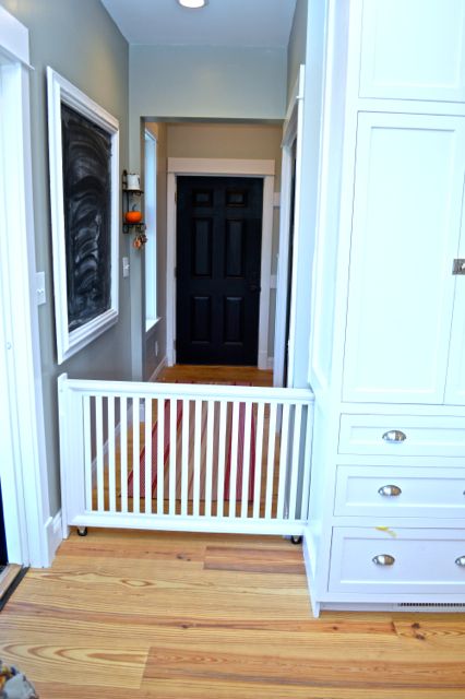 When customizing our cabinets, we worked with our cabinet builder to create a built-in hidden dog gate, perfect for our family! Built In Baby Gate, Hidden Dog Gate, Pocket Gate, Diy Dog Gate, Kitchen Built Ins, Dog Gates, Pet Gates, Building A Kitchen, Stair Gate