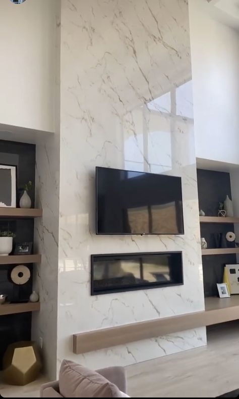 Modern Firewall Design, Fireplace Ideas Luxury, Marble Entertainment Wall, Marble Floor To Ceiling Fireplace, Quartz Tile Fireplace, Open To Above Living Room Fireplaces, Marble Wall Fireplace Living Rooms, Fireplace Feature Wall Ideas Modern, White Quartz Fireplace Wall