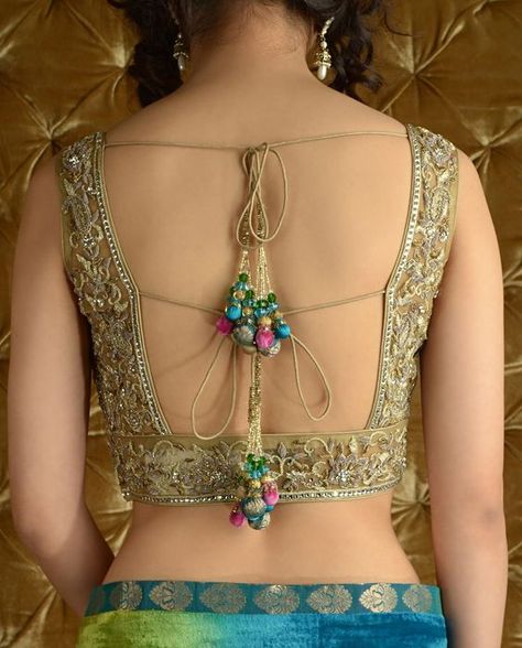 10 Striking And Unique Dori Designs That Will Enhance The Look Of Your Blouse Indian Blouse Designs, South Indian Blouse Designs, Saree Backless, Backless Blouse Designs, Saree Blouse Neck Designs, Blouse Back Neck Designs, Blouse Back, Sari Blouse Designs, Blouse Designs Indian