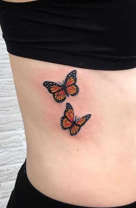 #butterflytattoo #butterflytattoodesigns Two Monarch Butterflies Tattoo, Buterfluffy Tatoos, Small Monarch Butterfly Tattoo, Butterfly Tattoo Monarch, Orange Butterfly Tattoo, Two Butterflies Tattoo, 2 Butterfly Tattoo, Color Butterfly Tattoo, Butterfly Thigh Tattoo