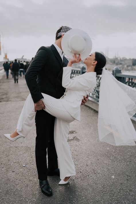 Bride in white suit and veil Suit And Veil Bride, Wedding Suit Women, Wedding Suits For Bride, Pre Wedding Photoshoot Theme, White Wedding Suit, Bride Suit, Wedding Photo Studio, Pre Wedding Shoot Ideas, Mini Wedding Dresses