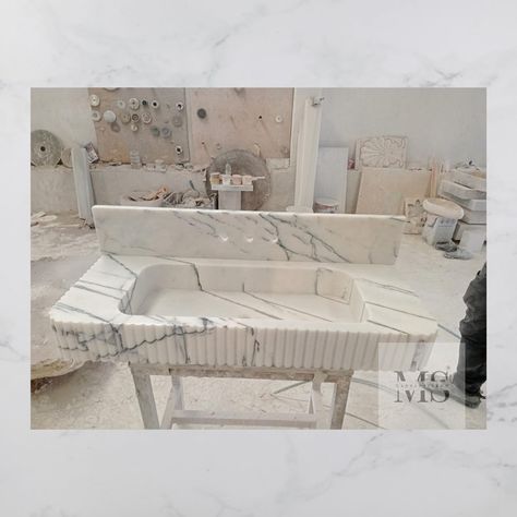 Indulge in timeless elegance with our Calacatta Viola Marble Sink, boasting a cube-shaped design adorned with intricate veining. This versatile piece is perfect for various applications, including makeup tables, wall mounts, vessel sinks, and more. Available in custom sizes to suit your needs. Special Order: 48cm x 120cm x 47,5 cm Elevate your bathroom ambiance with our meticulously hand-carved Calacatta Viola Marble Sink. Crafted to perfection, this sink adds a touch of luxury to your wall m... Sink Backsplash Bathroom, Marble Sink Kitchen, Backsplash Bathroom Sink, Kitchen Sink Backsplash, Sink Powder Room, Sink Backsplash, White Marble Sink, Powder Room Sink, Marble Sink