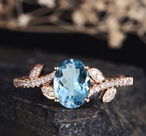 ✔ PRODUCT INFORMATION Material: Brass Gemstone: Lab-Created Sky Blue Topaz Mainstone Size: 6x8 mm Ring Weight: 3 gram Size: 6,7,8,9,10 US 🖤 It's dainty and can be worn every day 🖤A special piece you'll treasure 🖤 High-quality materials and attention to detail ✔Occasion: Dating / party / wedding / anniversary/propose ✔ 100% HANDMADE Each item handmade individually. ✔TURN AROUND TIME ♦️️All items are custom-made to order. Our turnaround time is about 7 - 10 business days. This can be changed du Rose Gold Halo Ring, Sky Blue Topaz Ring, Rose Gold Halo, Emerald Ring Gold, Engagement Ring Size, Gold Color Ring, Wedding Engagement Ring, Engagement Ring Sizes, Rose Engagement Ring