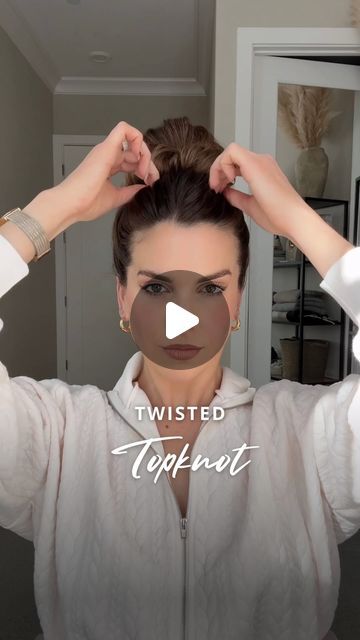 Nichole Ciotti on Instagram: "Twisted Topknot 💁‍♀️

Start by gathering your hair into a high ponytail. Create a mini loop by pulling the hair tie over the ponytail, but don’t pull all the hair through. Place your hand inside the elastic as you swoop the hand under the ponytail. Now, guide your hand clockwise, gathering the ponytail onto the elastic as you twist once. Once the twist is secure, pull the elastic, now wrapped with hair, back over the mini loop you formed earlier. Adjust and gently tug at the bun to shape.

#hair #hairtutorial #updo #hairstyles" The Bun, High Ponytail, Hair Back, Updo Hairstyles, High Ponytails, Top Knot, Hair Tie, Hair Tutorial, Hair Ties