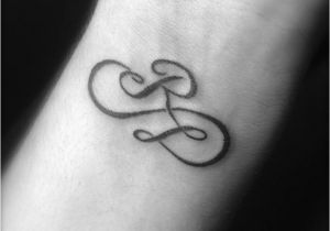 Letter R Tattoo, Infinite Tattoo, Tattoos For Women Small Meaningful, Kids Ring, Monogram Tattoo, Ring Finger Tattoos, Tattoos With Kids Names, Infinity Tattoos, Initial Tattoo