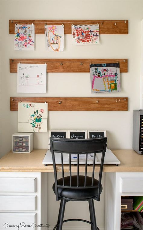 In order to make homework time a little easier, you may want to consider adding a kid-friendly workstation to your home! With space to display their artwork and work on any school projects, giving your kids a space that’s all their own can be a great way to redesign a corner of the playroom. Kids Homework Area, Harry Styles Imagine, Kids Homework Station, Diy Kids Art, Displaying Kids Artwork, Homework Station, Art Display Kids, Kids Study, Study Areas