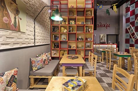 Alaloum Board Game Café / Triopton Architects Cafe Game Design, Board Game Room, Board Game Cafe, Game House, Game Cafe, Most Comfortable Office Chair, Interior Design Boards, Lounge Bar, Rustic Home Design