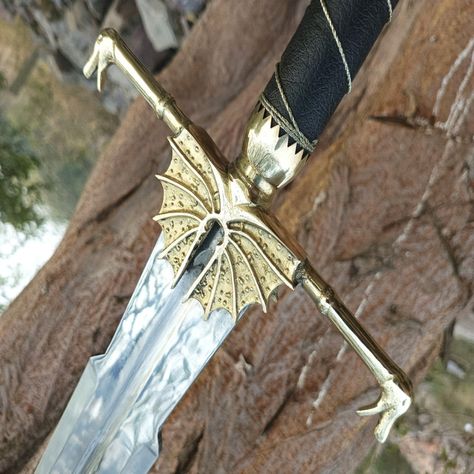 Attention all Game of Thrones and Lord of the Rings fans! Check out theelegantcrafts for amazing sword replicas. From Aegon Targaryen's Blackfyre sword to the Princess Elven Hadhafang Sword, they've got it all. All swords made with Damascus steel and available in different tangs and handle materials. #eBay #eBayStore #eBaySeller #Sword #GameofThrones #LordoftheRings Elegant Crafts, Valyrian Steel, Medieval Market, The Witcher Geralt, Bronze Dragon, Inner Warrior, Swords Medieval, Dragon Rider, Cool Swords