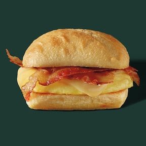 Starbucks Breakfast Sandwich, Starbucks Sandwiches, Gouda Sandwich, Artisan Rolls, Starbucks Breakfast, Egg Sandwich Recipe, Vegas Food, Bacon Sandwich, Starbucks Menu