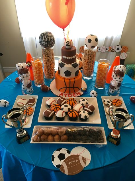 Sports Birthday Theme - Dessert Table for Ayden's 2nd Birthday - basketball baseball soccer football - sports cupcake - sports cookies - champion - balls - sweet table Sport Cupcakes, Sports Baby Shower Theme, Baby Shower Games Coed, Sports Baby Shower, Basketball Birthday Parties, Sports Theme Birthday, Ball Birthday Parties, Sports Birthday Party, Basketball Birthday