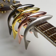 Shark Capo for Acoustic or Electric classical… Vintage Guitars Acoustic, Bass Ukulele, Guitar Lessons For Beginners, Guitar Tuners, Learn To Play Guitar, Guitar Tips, Guitar Art, Guitar Accessories, Ukelele