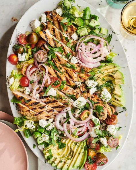 Credit: Photo: Joe Lingeman; Food Styling: Anna Stockwell Credit: Photo: Joe Lingeman; Food Styling: Anna StockwellThis bright and satisfying grilled chicken salad is the perfect easy summer dinner to add to your rotation. You’ll start with a bed of sturdy romaine lettuce for crunch, then toss in a handful of fresh herbs to brighten it up. Mix in cucumbers, juicy tomatoes, creamy avocado, lightly pickled red onion, and tangy goat cheese crumbles, then top it off with lime-kissed slices of Salad List, Perfect Grilled Chicken, Savoury Treats, Green Salads, Recipes Salads, Salad With Chicken, Mediterranean Meals, Satisfying Salads, Easy Summer Dinners