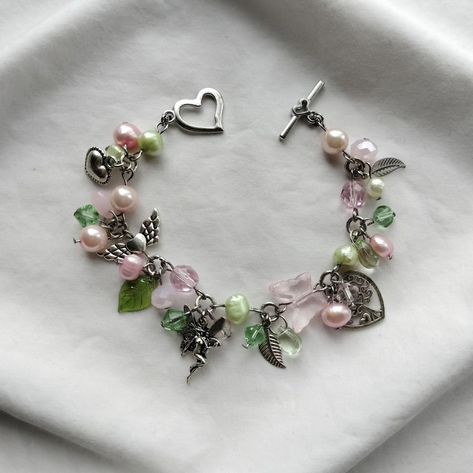 these bracelets will all be available on the site and through dm at 10am nzst on thursday <3 - - - - - - - - - - #handmadejewelry #handmade #smallbusiness #fairycore #fairy #custom #customjewelry #cottagecore #cottagecorejewelry Fairy Trinkets, Fairycore Bracelet, Fairy Bracelet, Cottage Core Jewelry, Fairy Bracelets, Fairycore Fairy, Beaded Crafts, Bracelet Design, Fairy Core