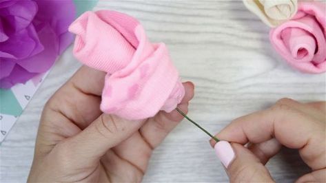 How to Make Flowers Out of Baby Socks: 14 Steps (with Pictures) Baby Socks Flowers, Sock Bouquet, Used Socks, Baby Sock Corsage, Baby Sock Bouquet, How To Make Socks, Easter Saturday, Honey Bee Baby Shower, A Bunch Of Flowers