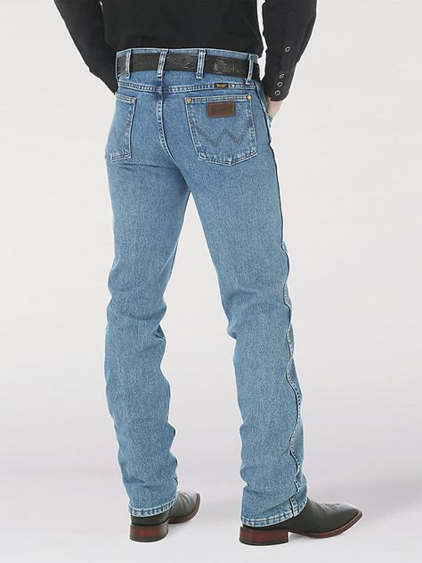 LONG-LASTING DENIM IN A POPULAR FIT Once you find the perfect fit, there's just no going back. These Cowboy Cut® slim fit jeans place a modern spin on our most popular Western style, the 13MWZ. With 20% longer lasting denim and a more comfortable waist, the Wrangler® Cowboy Cut® men's jeans are guaranteed to get you where you need to go and keep you feeling comfortable. Our Premium Performance Cowboy Cut® slim fit jeans come fully equipped with all the authentically Western details you know and Wrangler Wrancher Outfit Men, Cowboy Jeans, Vintage Wrangler Jeans Outfit, Wrangler Jeans Aesthetic Men, Men’s Bootcut Jeans, Vintage Wrangler Jeans, Men’s Wrangler Jeans, Wrangler Cowboy Cut, Sunday Clothes