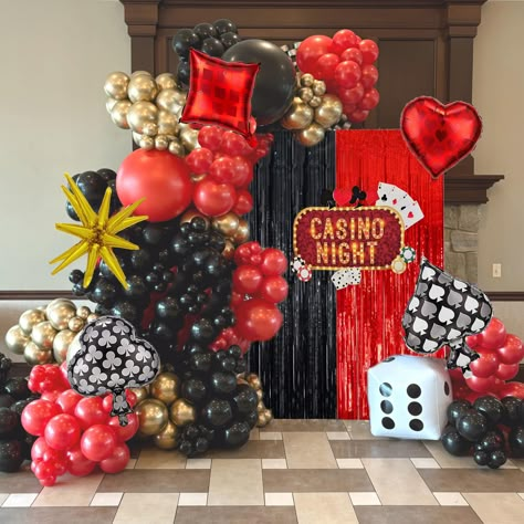 PRICES MAY VARY. **Ultimate Casino Theme Party Decorations**: Elevate your party with this deluxe set: 48 sleek black balloon (18inch*1, 10inch*20, 5inch*27), 48 vibrant red balloon (18inch*1, 10inch*20, 5inch*27), 47 shimmering metallic gold balloons (10inch*20, 5inch*27), 1 starburst balloon (22"), 4 casino poker balloons, 1 dice balloon, 2 foil curtain backdrops (1x2m each in red and black), glue dots*100, and 1 ribbon. **Casino Party Decorations**: Perfect for a wide range of celebrations in Red Gold Balloon Garland, Casino Royale Theme Party, Starburst Balloon, Vegas Prom, Casino Theme Party, Party Decorations Black, Casino Birthday Party, Black And Gold Party Decorations, Homecoming 2024