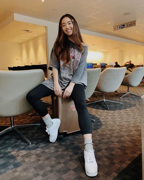 Image may contain: 1 person, sitting, shoes and indoor Oversized Tshirt Outfit Casual, Baggy Tshirt Outfit, Jenn Im, Oversize Tshirt Outfits, Tee Shirt Outfit, Baggy Tee, Outfit Oversize, Outfits Baggy, Airport Look