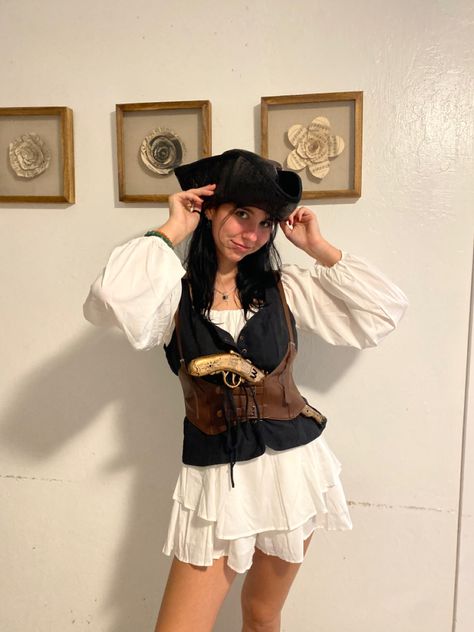 pirate. pirate costume. halloween. cute pirate costume. women pirate costume. aesthetic pirate costume. halloween costume. halloween costume ideas. halloween ideas. simple pirate costume. pirate hat. fake gun. corset. black hair. white dress. white romper. halloween inspo. Space Pirate Costume, Pirate Costume Simple, Simple Pirate Costume Women, Aesthetic Pirate Costume, Cute Pirate Costume Women, Black Hair White Dress, Pirate Costume Aesthetic, Simple Pirate Costume, Cute Pirate Costume