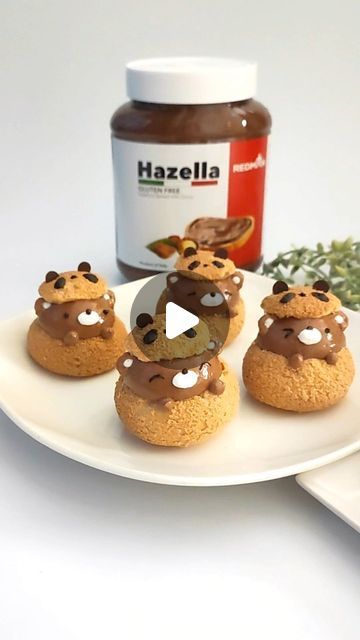 Phay Shing on Instagram: "Chocolate Hazelnut Choux Pastry Bears (makes about 15 small pastries) I was given 2 bottles of Hazella from @phoonhuat to try, so I decided on sharing something cute, simple & yummy that doesn't take much baking skill & uses minimal ingredients! Please scale quantity according to preference. Choux pastry: Craquelin: 21g unsalted butter 18g sugar 21g plain flour, sifted Batter: 60g water 20g unsalted butter 1/8 tsp fine salt 1/2 tsp sugar 30g plain flour, sifted 1 l Small Pastries, Choux Pastry, Plain Flour, Chocolate Hazelnut, Dessert Bars, Marshmallows, Unsalted Butter, Hazelnut, I Decided