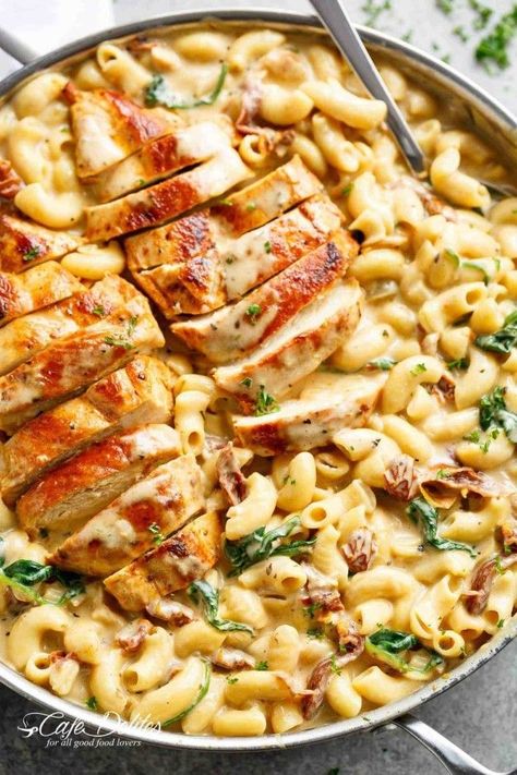 This stovetop mac 'n' cheese recipe comes together in 30 minutes and tastes way better than the boxed variety. Get the recipe. Tuscan Chicken Mac And Cheese, Chicken Mac And Cheese, One Pot Dinners, Tuscan Chicken, One Pot Dinner, Eggplant Parmesan, Salad Pasta, Makanan Diet, Bakery Ideas